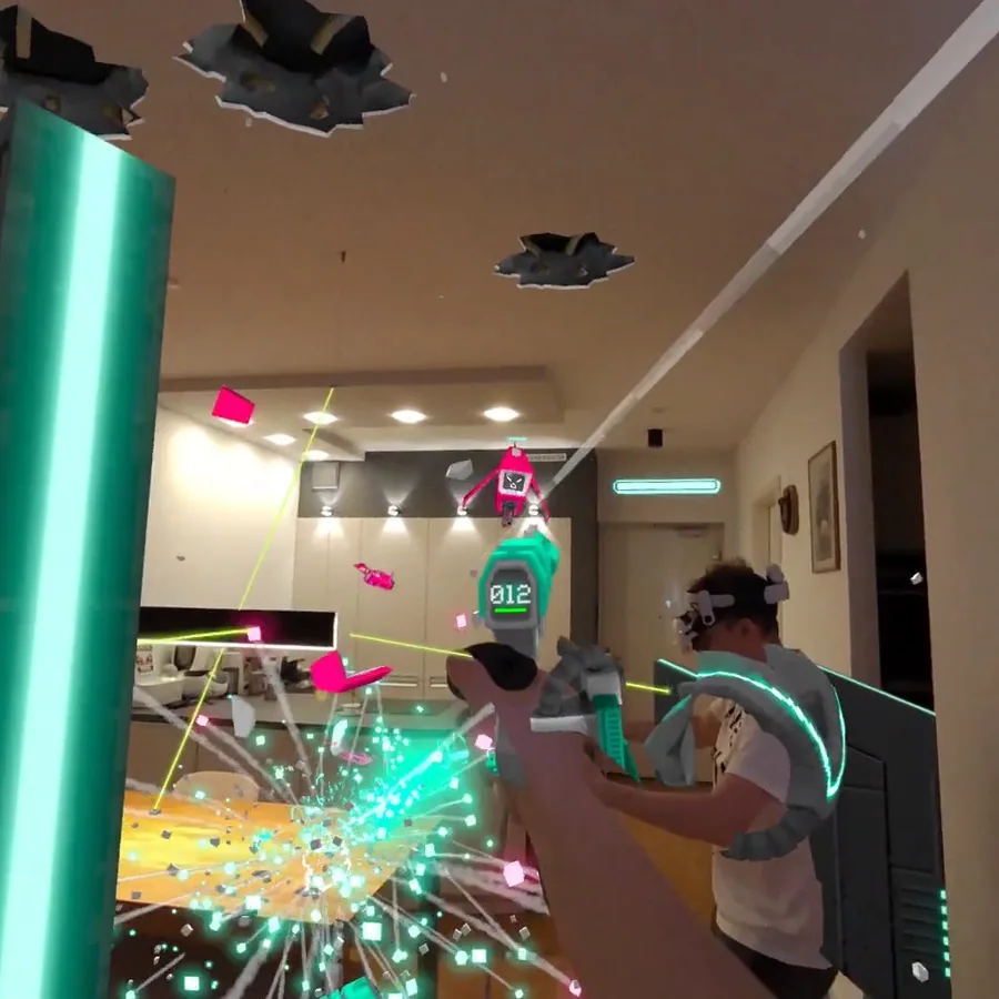 Zwei VRTAG-Spieler kooperieren zwischen virtuellen Elementen